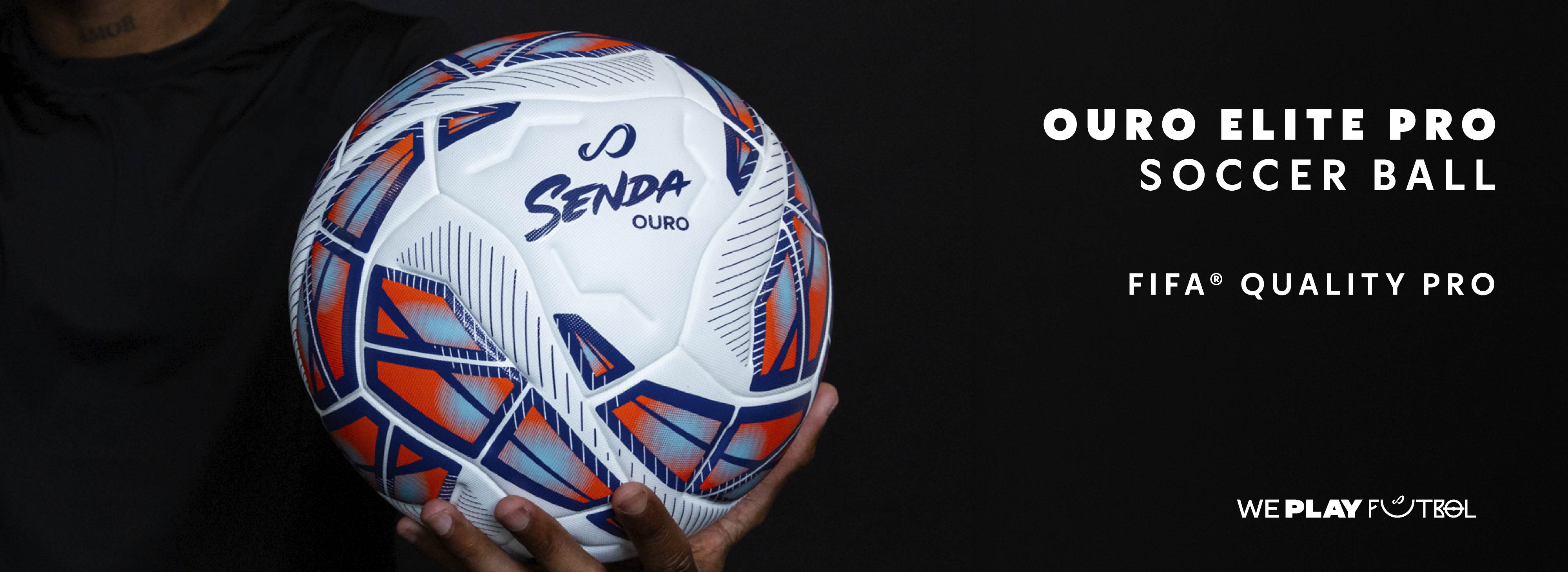 Senda Ouro Elite Pro soccer ball held by a person against a black background