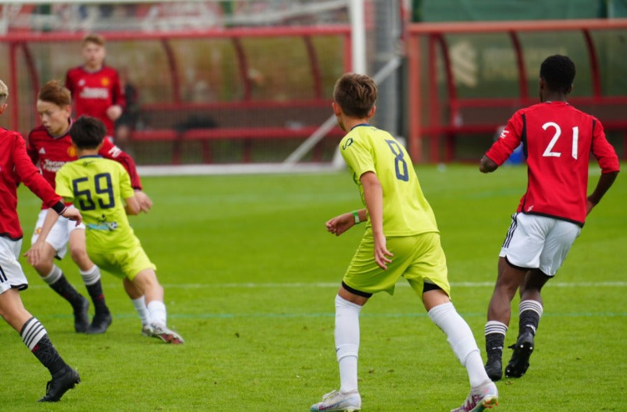 SGA Roots players in Senda gear against Manchester United.