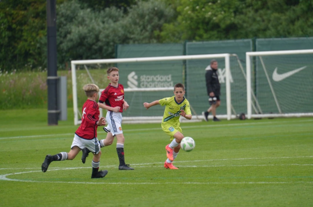 SGA Roots players in Senda gear against Manchester United.