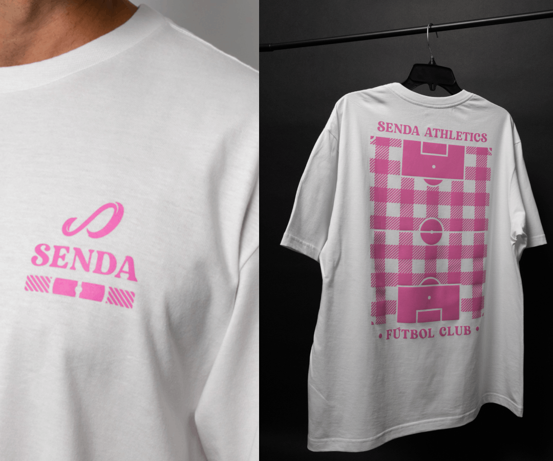 White t-shirt with pink 'Senda' logo on front and back design on a dark background. Senda Lifestyle Apparel Collection
