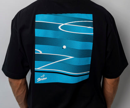 Black t-shirt with blue and white abstract design on the back, on a plain background. Senda Lifestyle Apparel Collection