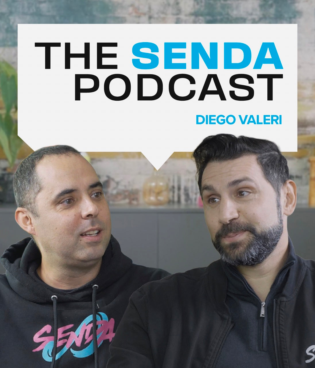 Two men standing in front of a branded backdrop with 'The Senda Podcast' and 'Diego Valeri'.