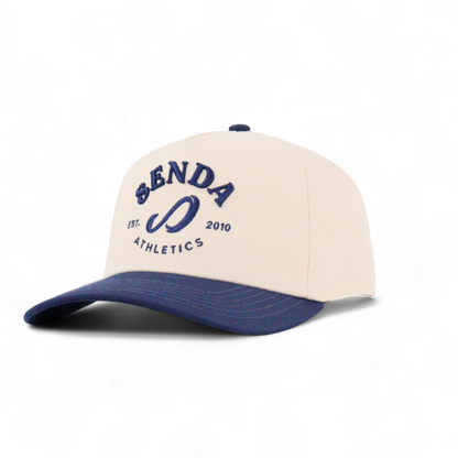 Beige and blue cap with 'Senda Athletics' branding on a white background